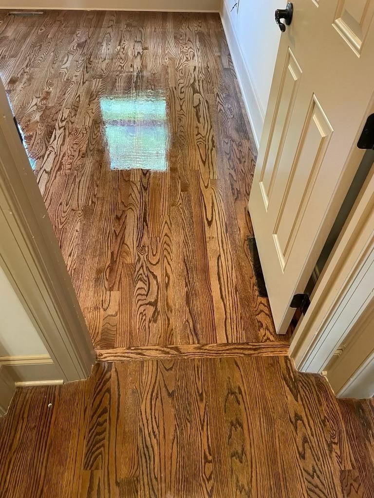 Refinished red oak hardwood hallway